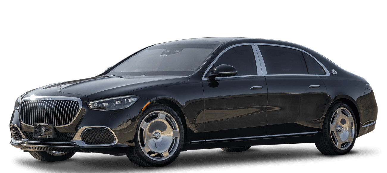 A luxury black armored Mercedes Maybach with large silver wheels and a distinct chrome front grille. The car has tinted windows and sleek, aerodynamic design lines.