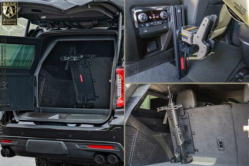 This image shows the interior compartments of a car with a secure mount holding a firearm. One compartment is at the rear, another at the side, and a third in the backseat area.