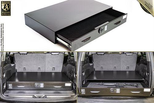 Image showing a black security drawer for vehicles, first separately, then installed in a vehicle with its drawer both closed and open, revealing ample storage space and a firearm.