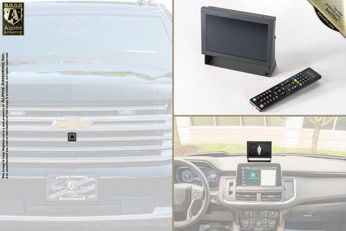 Split image: Top left shows the front grille of a Chevrolet vehicle, top right features a display screen with a remote, and bottom right displays an in-car dashboard with a screen showing a camera feed.